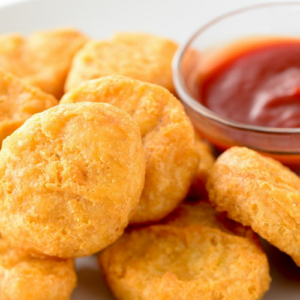 NUGGETS DE PECHUGA DE POLLO (12 PZ)